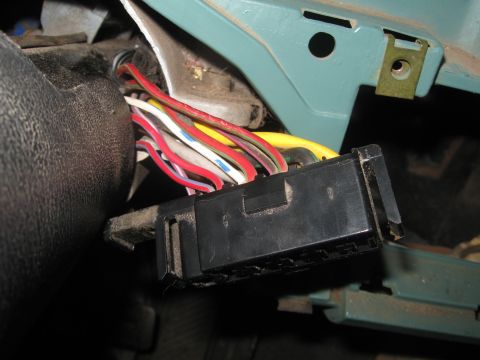 1981 Ford Bronco - Close-up view of a vehicle's interior wiring harness and connector.