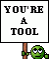 1995 Ford Bronco - A cartoon character holds a sign with text that reads 'YOU'RE A TOOL'.