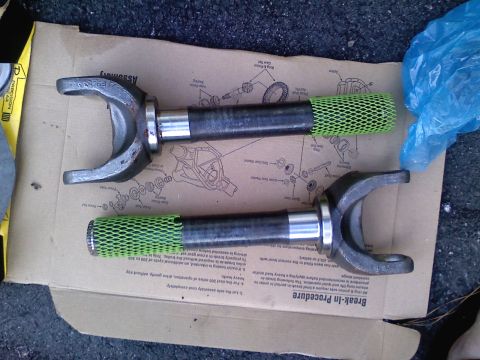 1990 Ford Bronco - Axle shafts are shown on a diagram detailing their assembly and break-in procedure.