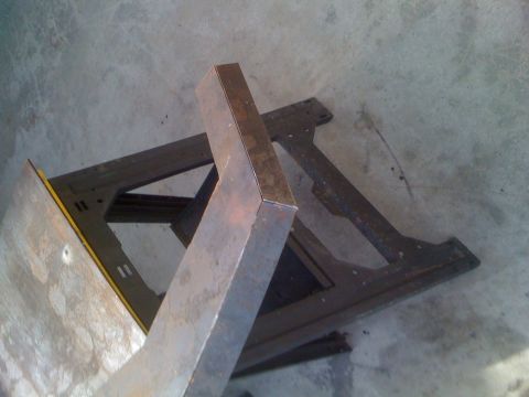 1992 Ford Bronco - A metal frame part is shown on a concrete floor.