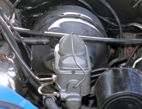 1976 Ford Ranchero - Close-up view of a brake master cylinder and booster assembly, with 'SUPERMOTORS' visible on a watermark.