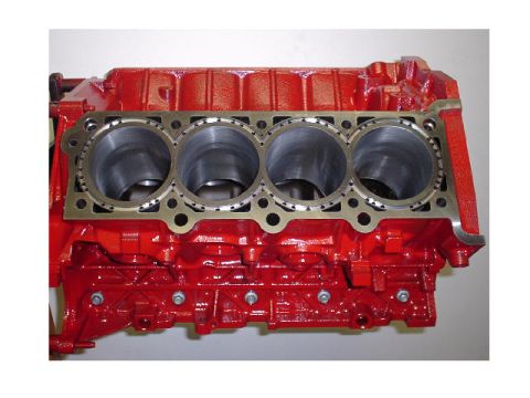 2001 Ford Crown Victoria - Close-up view of a red engine block, showing the cylinder bores.