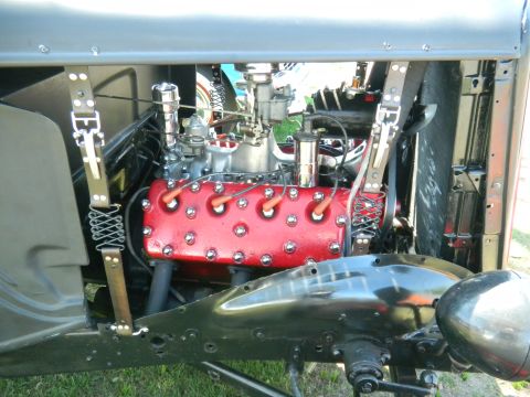 1997 Ford Ranger - The engine bay of a classic vehicle, showing a detailed view of the V8 motor.