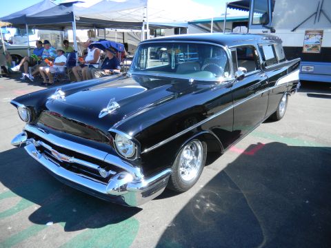 1997 Ford Ranger - A classic black Chevrolet Nomad station wagon is displayed at an outdoor event.