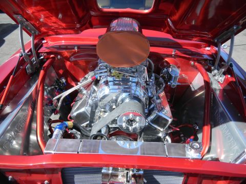1997 Ford Ranger - Customized engine bay features a prominent supercharger and polished components.