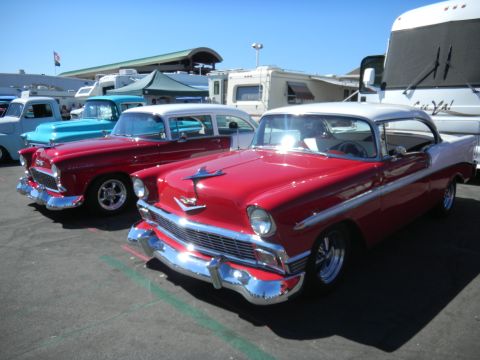1997 Ford Ranger - Two classic 1956 Chevrolet Bel Air models are parked together at an outdoor event.