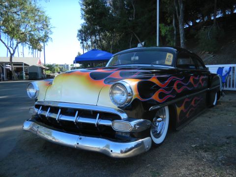 1997 Ford Ranger - This custom hot rod features a striking flame paint job and whitewall tires, seen at a Labor Day Cruise event.
