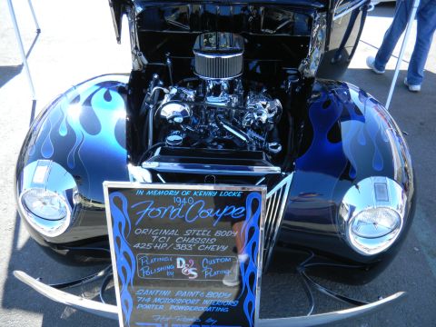 1997 Ford Ranger - A custom 1940 Ford Coupe hot rod with a detailed engine and flame paint job is displayed.
