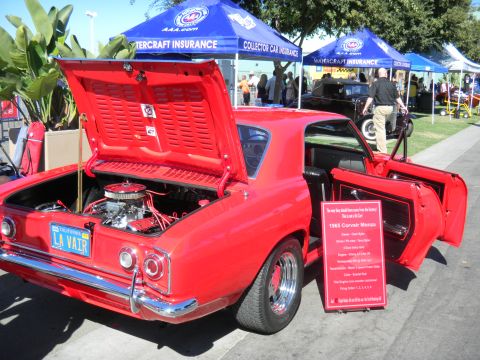 1997 Ford Ranger - 1965 Corvair Monza on display with its engine and interior visible.