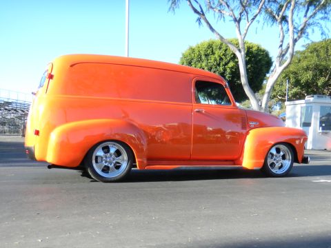 1997 Ford Ranger - This custom orange panel van was photographed at a car show.