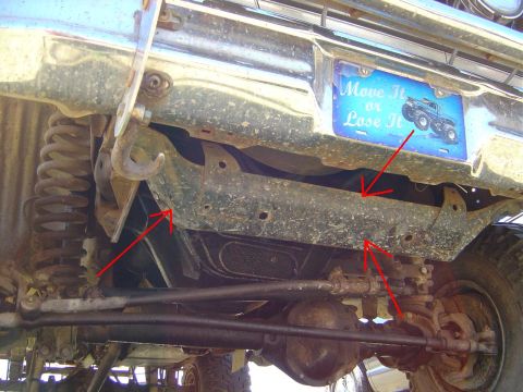 1986 Ford Bronco - This image shows the undercarriage of a vehicle, focusing on the frame and suspension system.