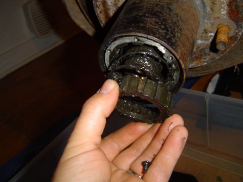 1995 Ford Bronco - Undo tension screw then remove gear.