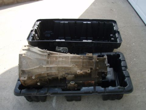 1994 Ford Bronco - Transmission removed from a vehicle and placed in a protective container.