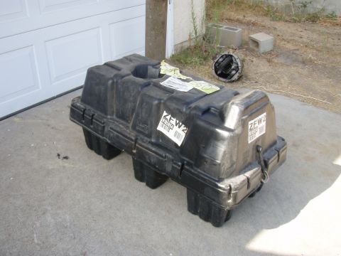 1994 Ford Bronco - A black plastic fuel tank is shown outdoors, with labels indicating ZFW2.