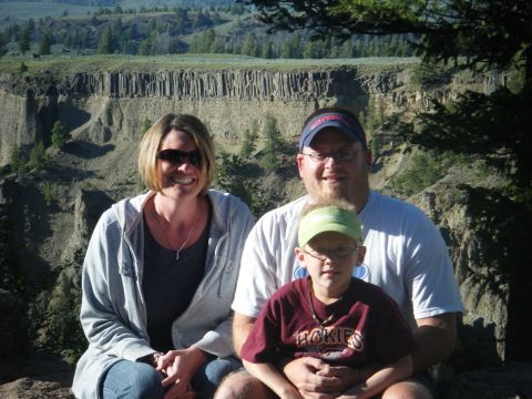 1981 Ford E350 - A family enjoys a scenic view at a canyon overlook.