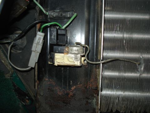 1979 Ford F-150 - Detail of an electrical component and condenser fins, likely from a vehicle's HVAC system.