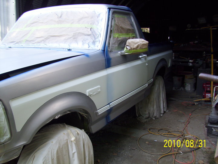 1993 Ford Bronco in progress of being painted, side view