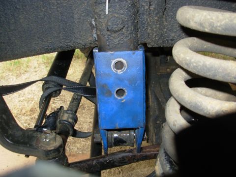 1975 Ford Bronco - It's pushed up as far as possible (against the bottom of the frame), and the hole in the original bracket is barely visible in the bottom o…