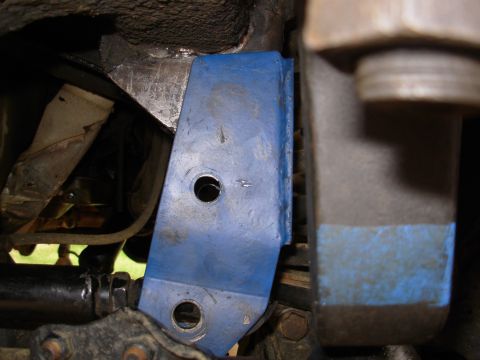 1975 Ford Bronco - Since it doesn't lie flat with the bolt in, I removed it to see how far away it is from the track bar eye when it's flat against the frame…
