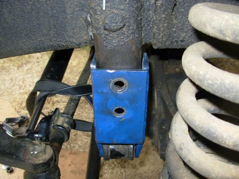 1975 Ford Bronco - So here it is flat against the frame AND pushed down until the upper hole is aligned with the one in the frame bracket.