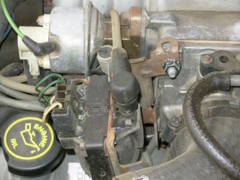 1975 Ford Bronco - The coil is still on the '88 truck bracket, but the bracket has been bent to fit here.