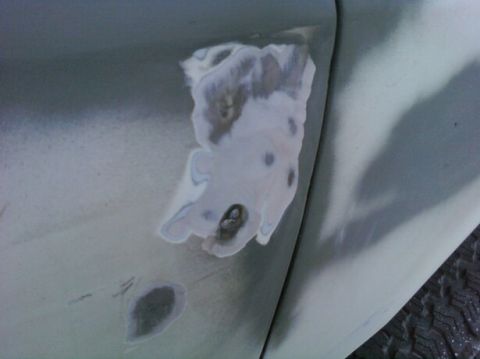1989 Ford Bronco - This image shows a section of a vehicle's bodywork where filler has been applied to repair damage.