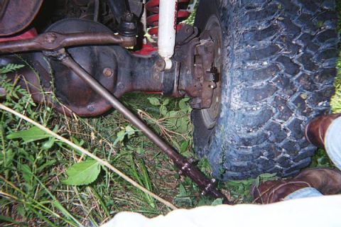 1986 Ford Bronco - Broken tie rod end. It got hung up on a stray piece of barb wire.