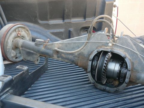 1988 Ford Bronco - Close-up of a rear axle assembly, showing the open differential housing.