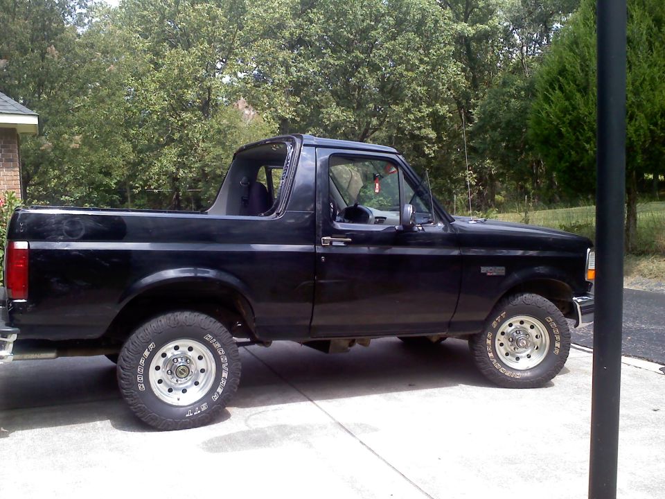 Black 1995 Ford Bronco parked outside