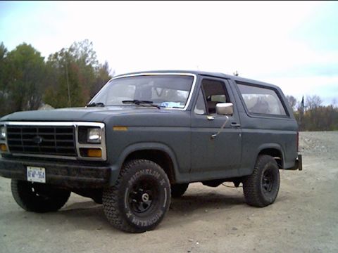 1981 Ford Bronco - This Ford Bronco has a boxy body style and a prominent grille, typical of the early 1980s models.
