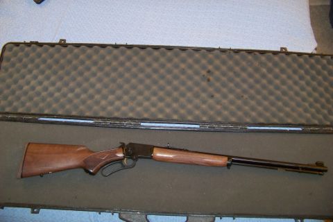1994 Ford F-150 - A lever-action rifle rests inside its protective gun case.