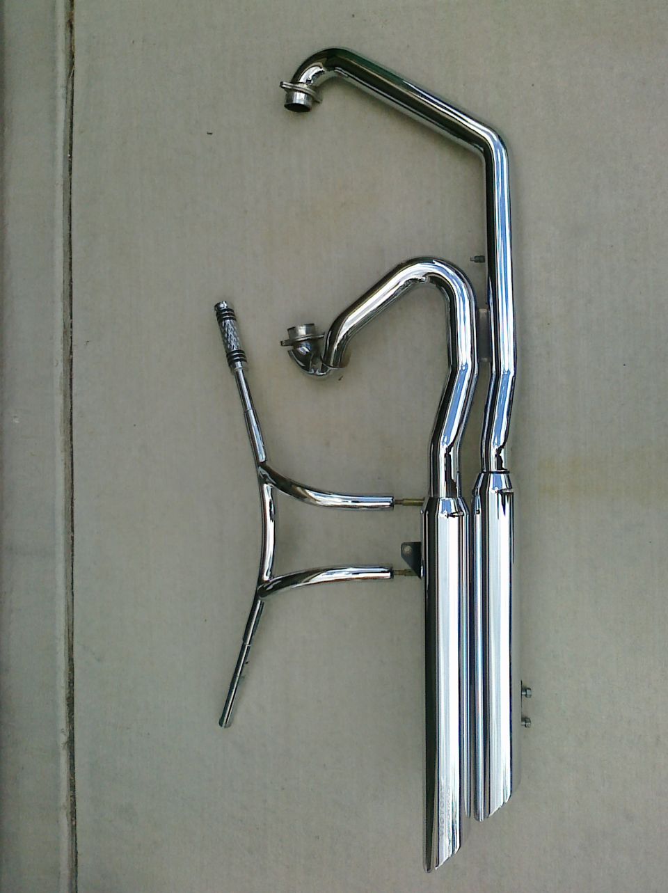 Chrome motorcycle exhaust pipes and header