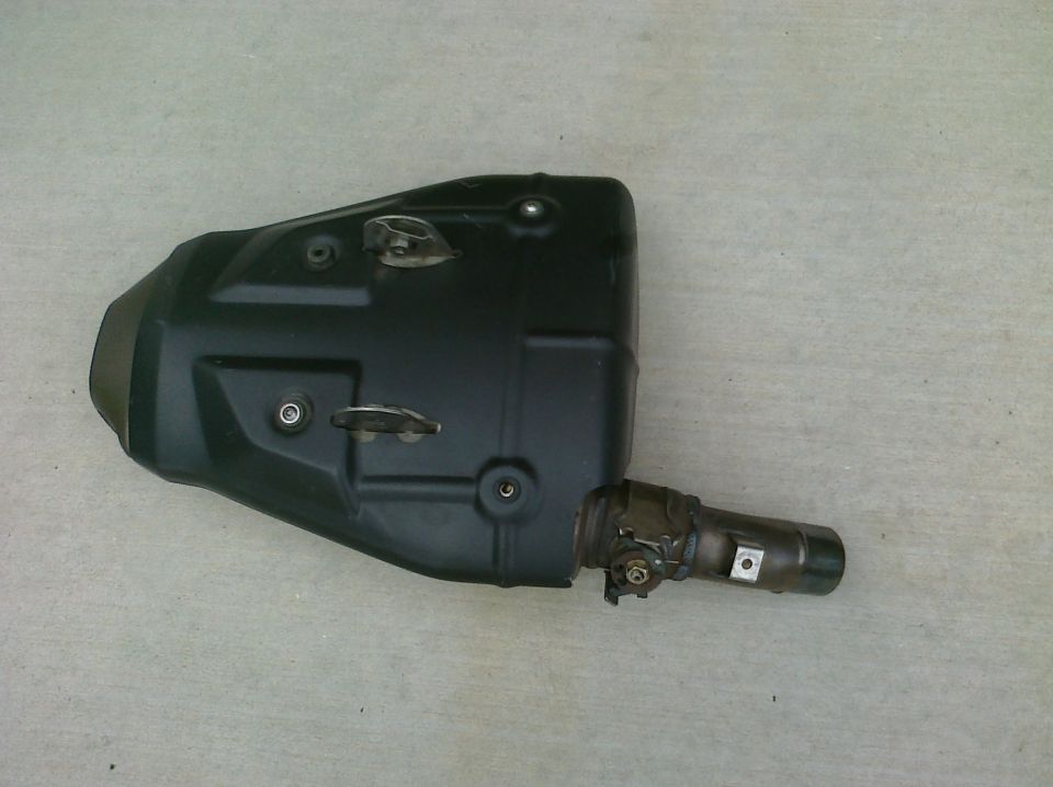 Black exhaust muffler with metal pipe attachment