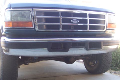 1995 Ford Bronco - Front view of a 1995 Ford Bronco, highlighting its grille and bumper.