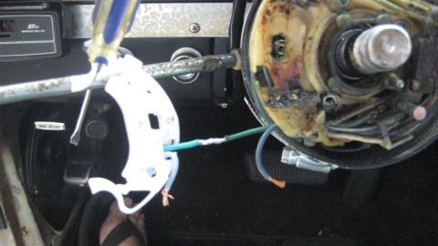 1968 Ford Ranchero - Steering column wiring is exposed, showing connections and internal components.