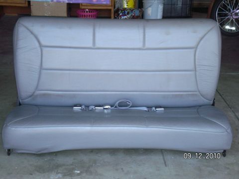 1996 Ford Bronco - A gray bench seat with seatbelts is shown, with a date stamp of 09.12.2010 visible in the lower right corner.