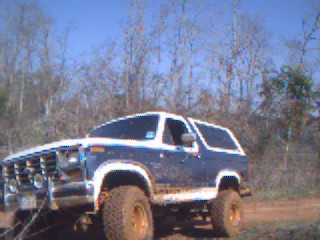 1986 Ford Bronco - This 1986 Ford Bronco is equipped for off-road adventures with its tires and extra lighting.