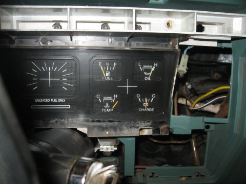 1981 Ford Bronco - The interior dashboard shows various gauges including fuel, oil, temperature, and charge indicators.