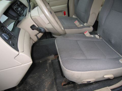 1991 Ford LTD Crown Victoria - Interior view of a car showing the seats, dashboard, and steering wheel.