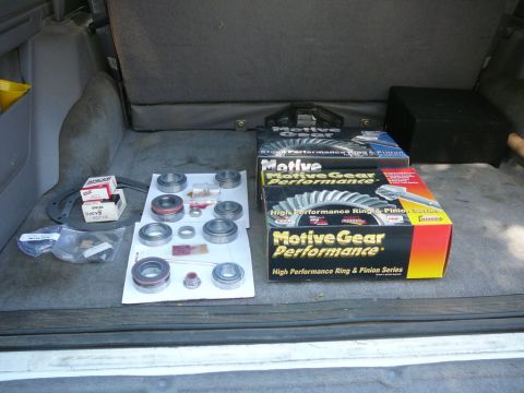 1988 Ford Bronco - New differential gears and bearings are organized for installation.