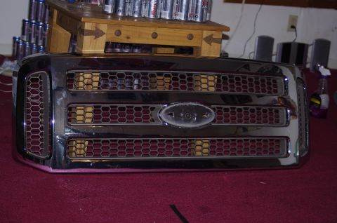 1999 Ford F-250 - This chrome grille with a honeycomb pattern is from a Ford F-250, likely from the 2005 model year.