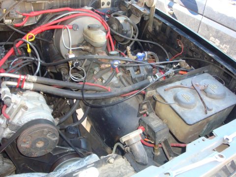 1989 Ford Bronco - Engine bay with various components and custom wiring visible.