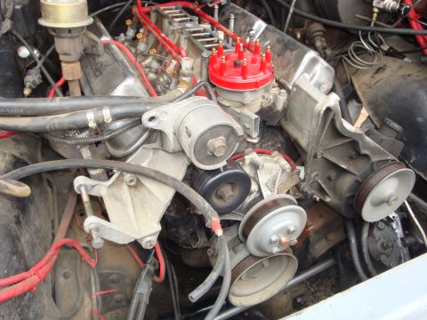 1989 Ford Bronco - Close-up view of a V8 engine's internal components and accessory drive system.
