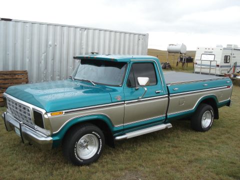 1979 Ford F-150 - This two-tone pickup truck displays a classic 1970s body style, consistent with the claimed model year.