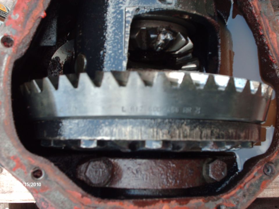 Close-up of differential gears with visible markings and date stamp