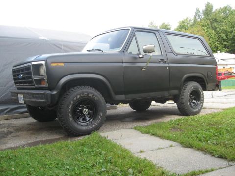 1981 Ford Bronco - This 1981 Ford Bronco is shown from the side in a matte black finish.