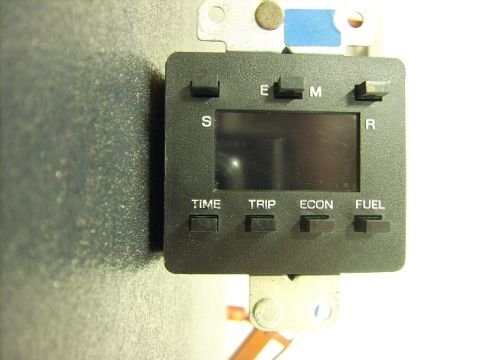 1988 Ford Crown Victoria LTD - This is a digital instrument cluster part with various function buttons and a display screen.