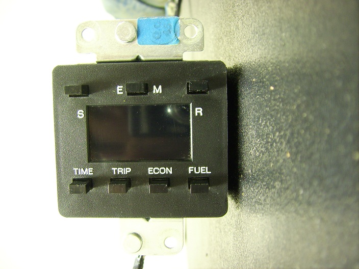 Digital odometer display with TIME, TRIP, ECON, FUEL buttons