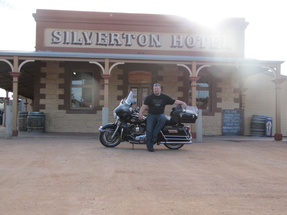 Black Harley touring bagger parked outside the Silverton Hotel