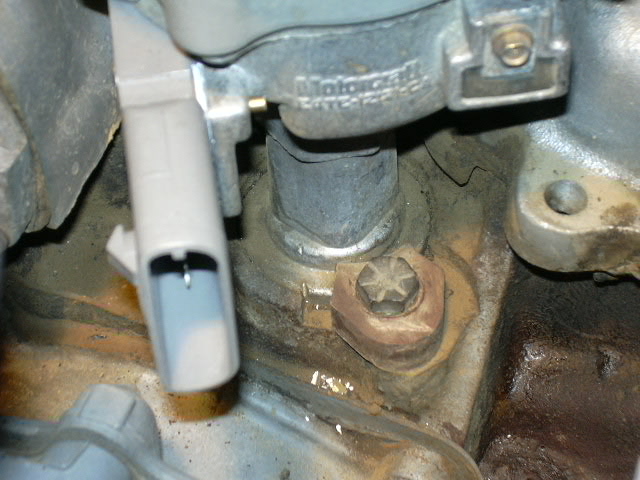 Took this picture to remember where the distributor was set at.  There's my new TFI module also.